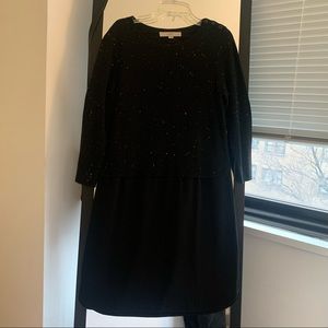 Black sweater/skirt dress.